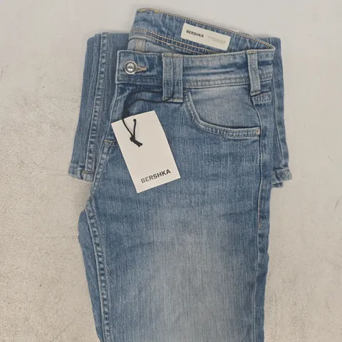BERSHKA FLARED LOW JEANS IN BLUE SIZE UK 8