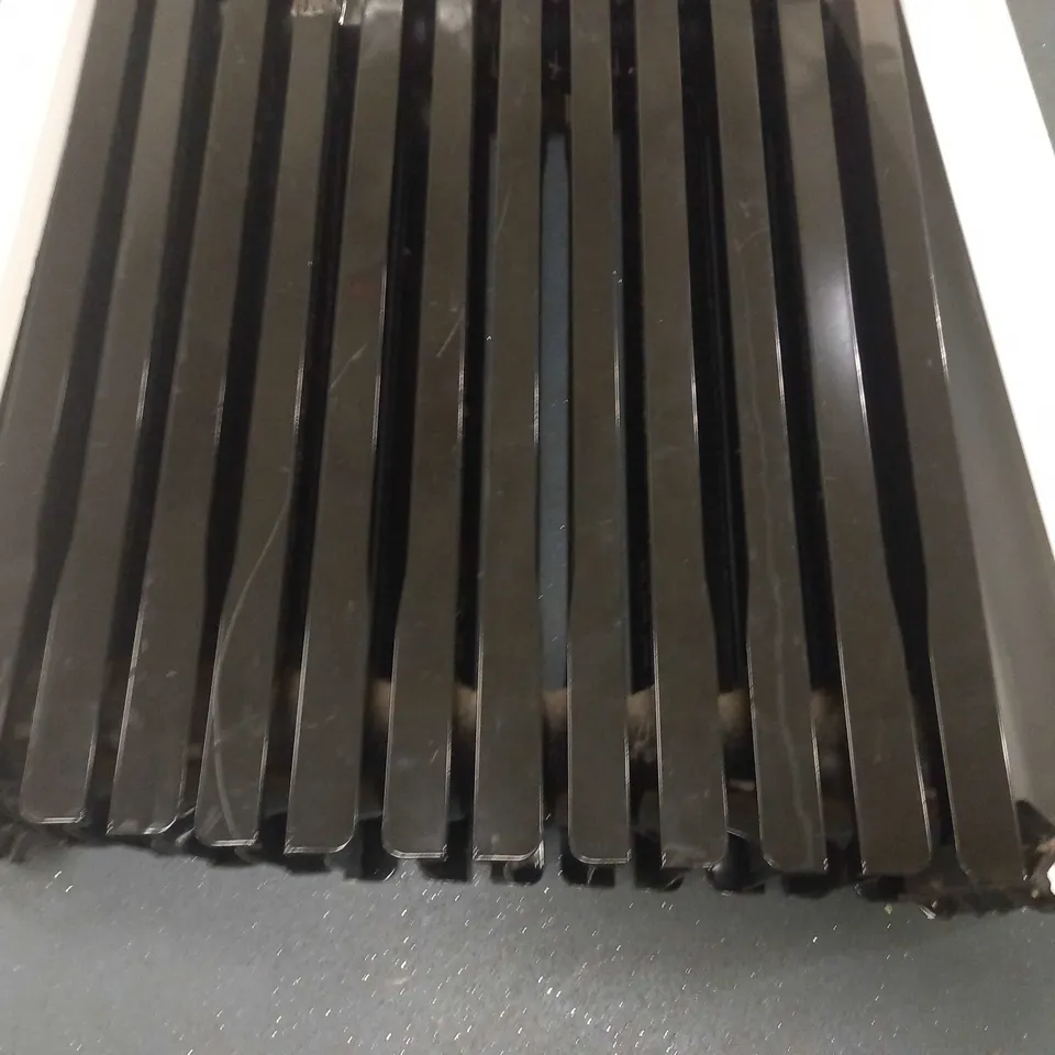 JOHN LEWIS OIL FILLED HEATER