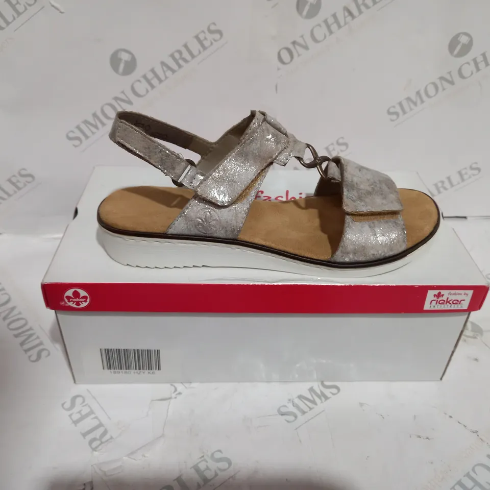 BOXED PAIR OF RIEKER MULTI-STRAP SANDALS IN METALLIC SILVER EU SIZE 39