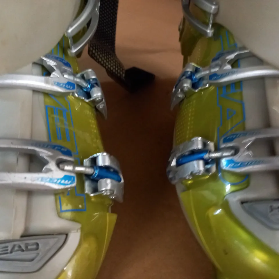 pair of head snowboarding boots in yellow - 29.0 / 29.5