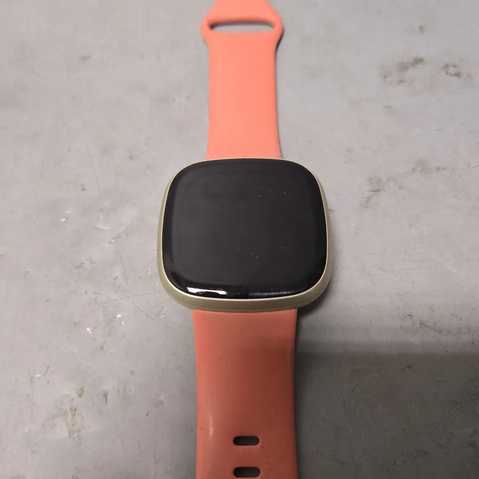 UNBOXED FITBIT IN SILVER WITH PINK RUBBER STRAP - MODEL UNSPECIFIED 