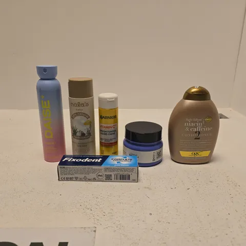 TOTE OF APPROXIMATELY 20 ASSORTED COSMETIC ITEMS TO INCLUDE OGX, FIXODENT, DAISE, GARNIER, NALAS BABY ETC