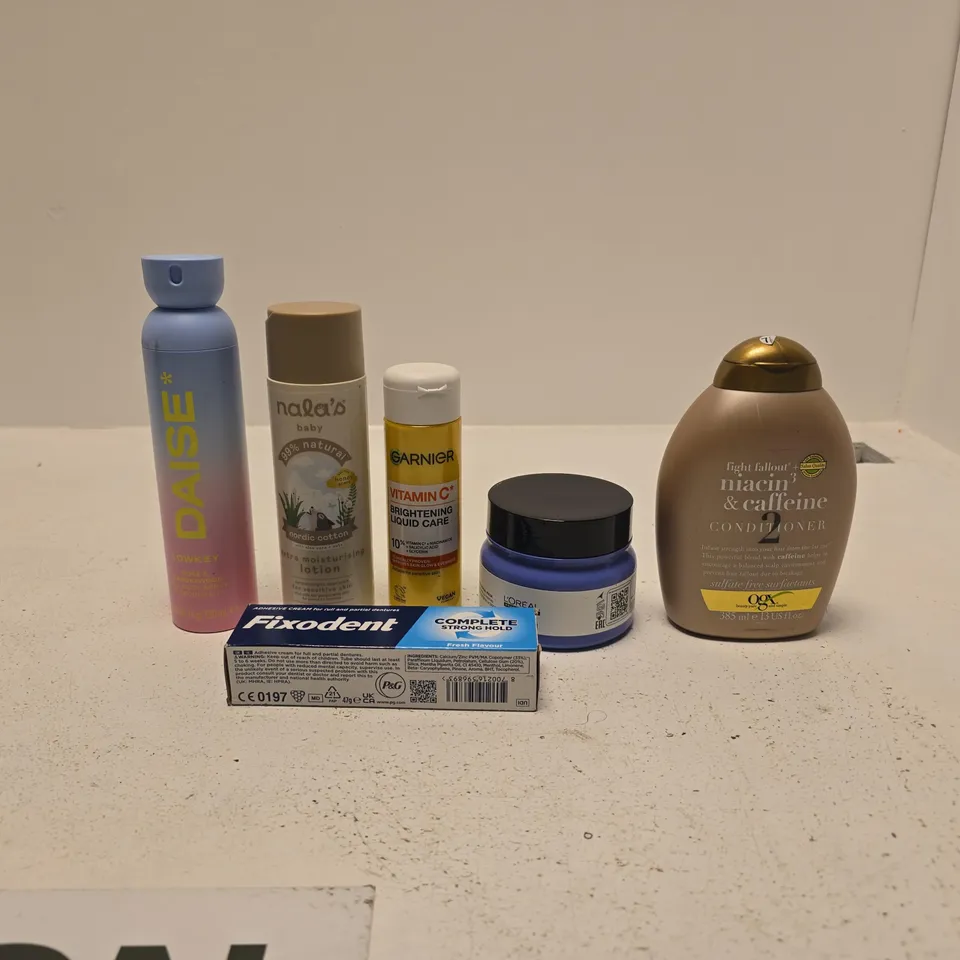 TOTE OF APPROXIMATELY 20 ASSORTED COSMETIC ITEMS TO INCLUDE OGX, FIXODENT, DAISE, GARNIER, NALAS BABY ETC