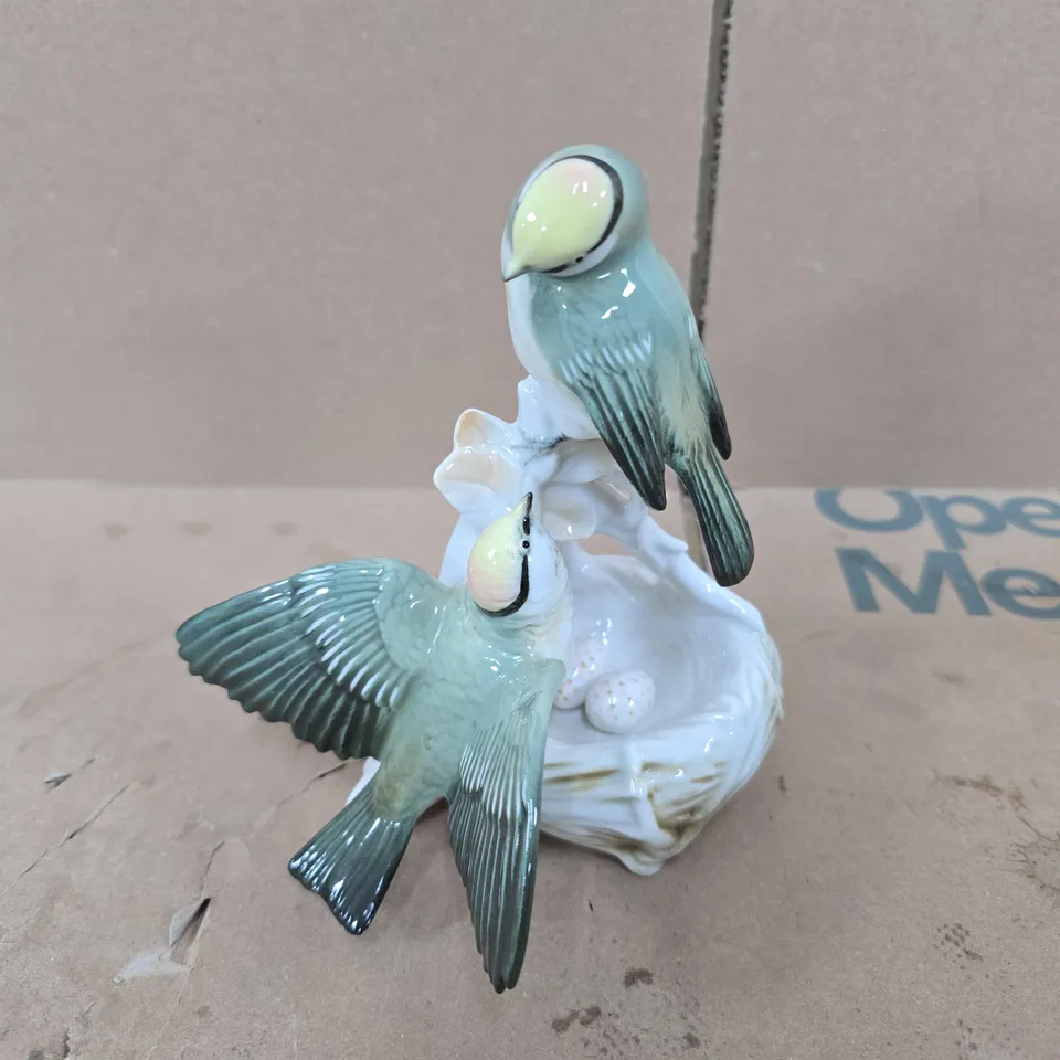STAMPED PORCELAIN BIRD FIGURINE