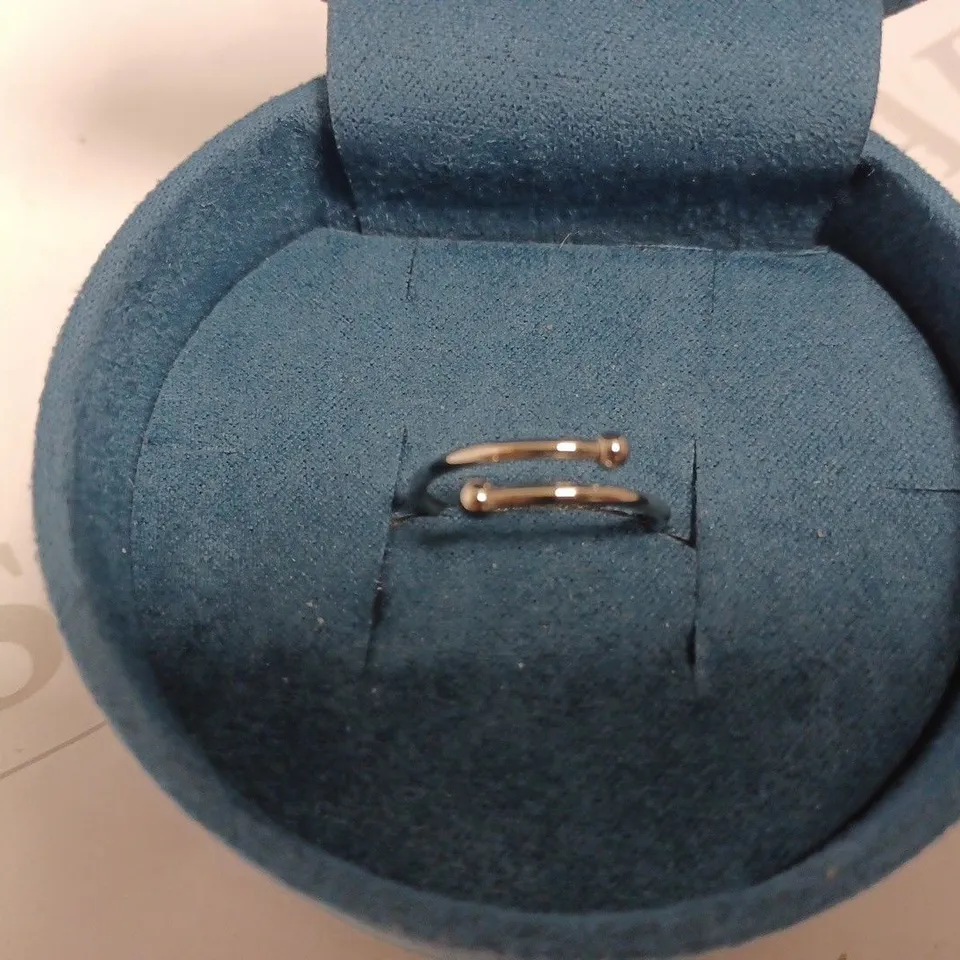 ABBOTT LYON SILVER EFFECT LOOP RING WITH YELLOW HEART DETAIL