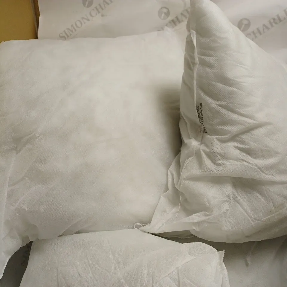 5 PILLOWS WITHOUT PILLOWCASES 