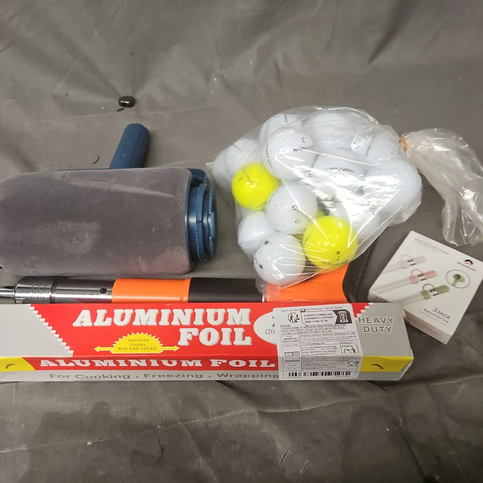 APPROXIMATELY 12 ASSORTED HOUSEHOLD ITEMS TO INCLUDE GOLFBALLS, ALUMINIUM FOIL, PAINT ROLLER, ETC