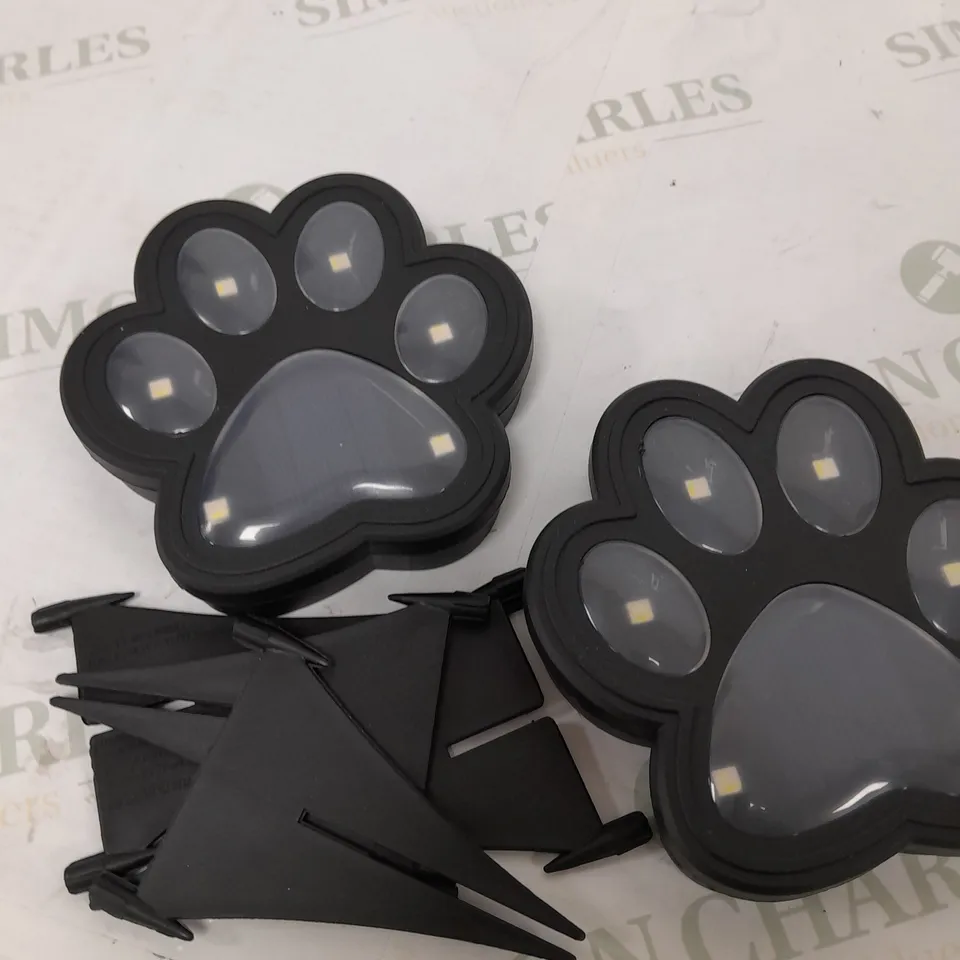 BOXED BELL AND HOWELL SET OF 4 SOLAR PAW LIGHTS