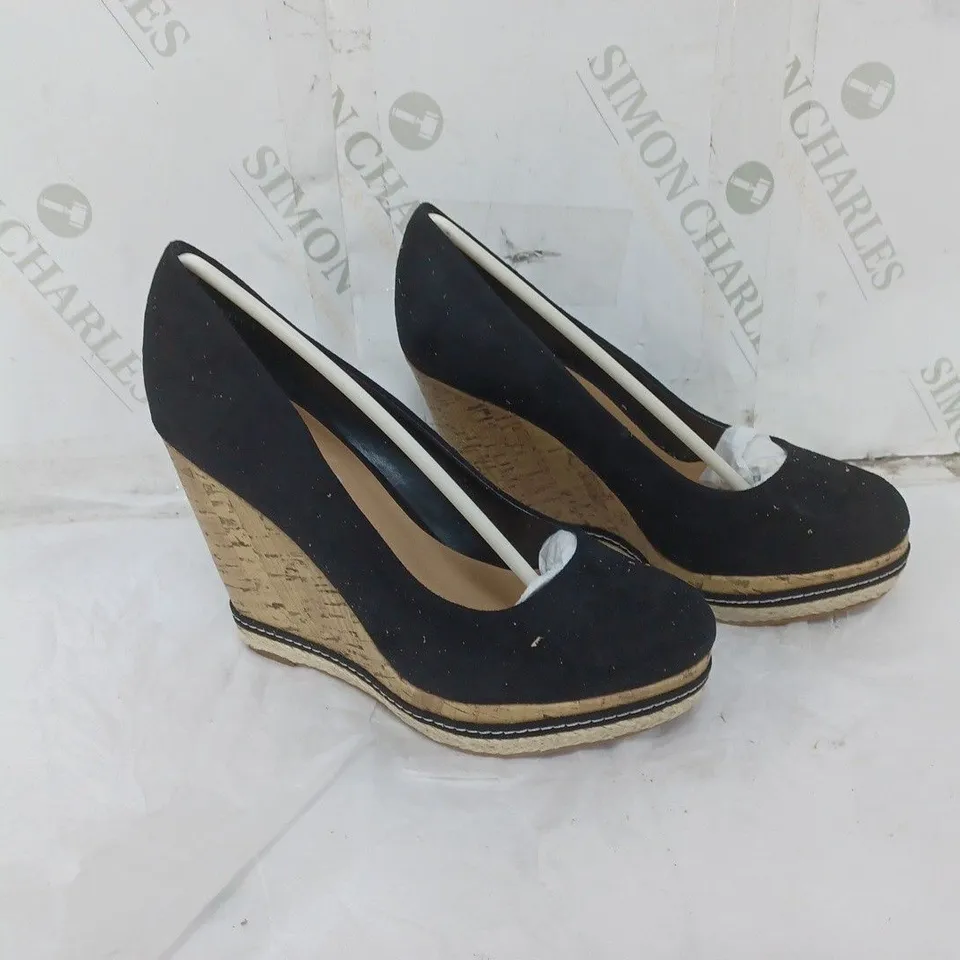 LARGE BOX OF APPROXIMATELY 8 BAGGED NEW LOOK WEDGE BLACK HEELS IN VARIOUS SIZES