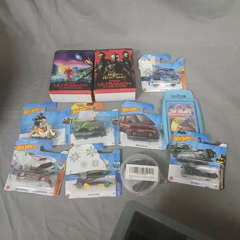 ASSORTED TOYS AND ACCESSORIES TO INCLUDE; HOT WHEELS 1:64 DIE-CAST CAR ASSORTMENT IN BLISTER PACKS (ULTRAMAN BOXED SETS INCLUDED)