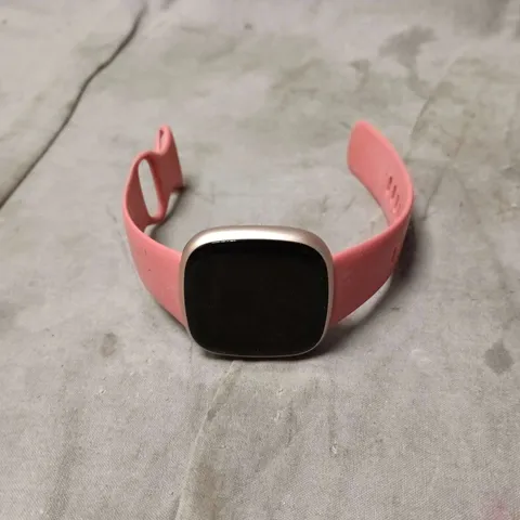 FITBIT SMART WATCH IN PINK. UNBOXED