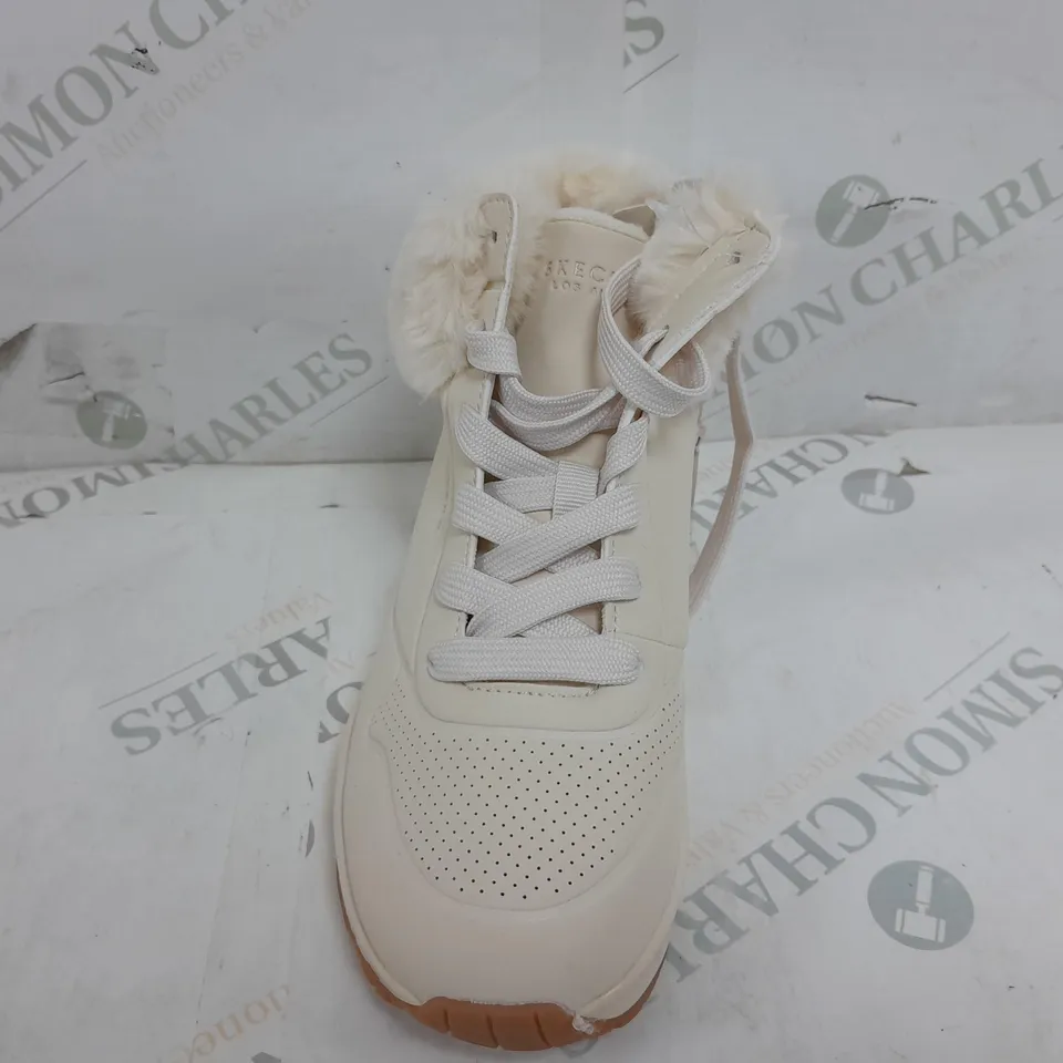 PAIR OF SKETCHERS FAUX FUR DECORATED TRAINERS IN CREAM - UK 2