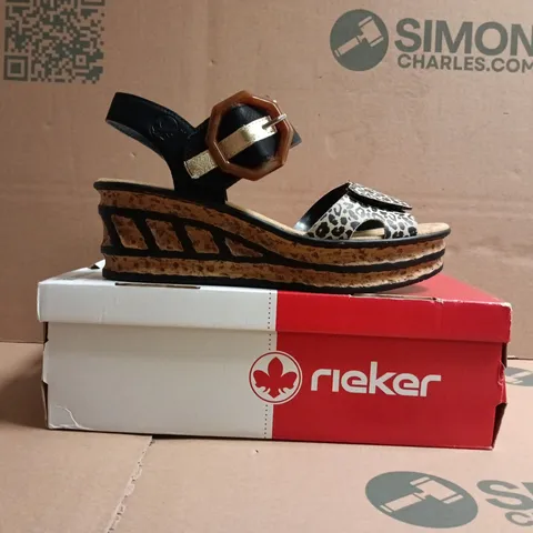 BOXED PAIR OF RIEKER OPEN TOE PLATFORM SANDALS IN ANIMAL PRINT/BLACK SIZE UK 6