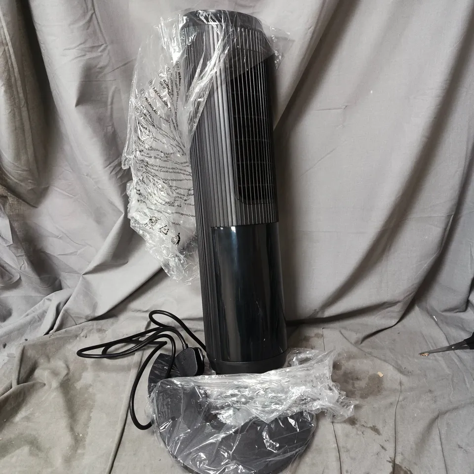 TOWER CERAMIC ELECTRIC FAN HEATER WITH REMOTE CONTROL. ITEM STATED AS DAMAGED