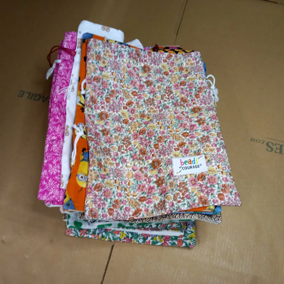 LOT OF APPROX 30 SEWN ASSORTED PATTERNS BEAD OF COURAGE WASH BAGS