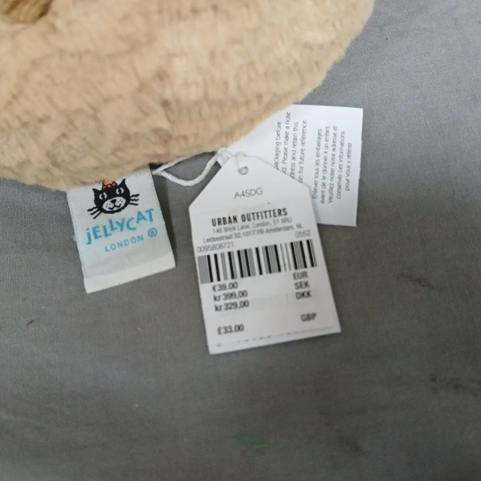 JELLYCAT LONDON PLUSH TOY – ROUND CREAM BODY WITH BROWN LEGS