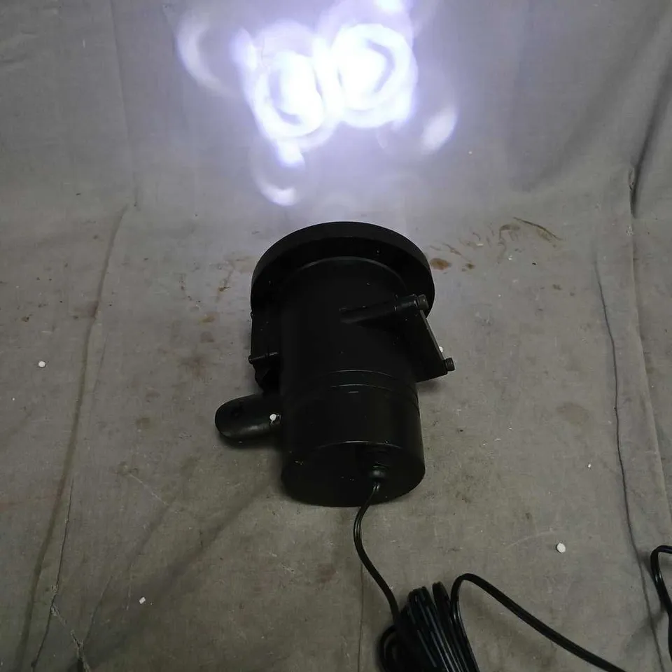 APPROXIMATELY 12 BOXED INDOOR/OUTDOOR LIGHT PROJECTORS WITH 8 SLIDES