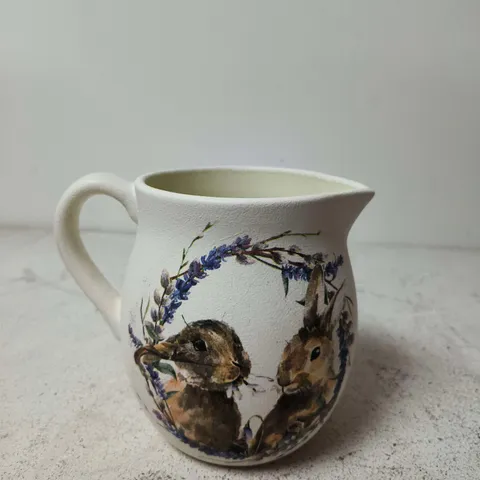 CERAMIC JUG WITH RABBIT MOTIF AND BLUE FLORAL BORDER β DECORATIVE PITCHER