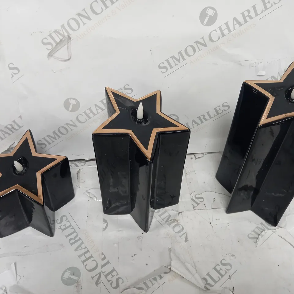 HOME REFLECTIONS CERAMIC STAR PRE-LIT CANDLES - BLACK