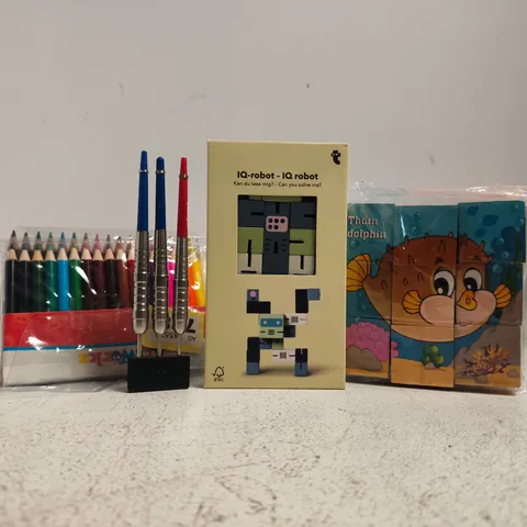 APPROXIMATELY 10 ASSORTED TOYS AND GAMES TO INCLUDE IQ-ROBOT, COLOUR PENCILS, ETC