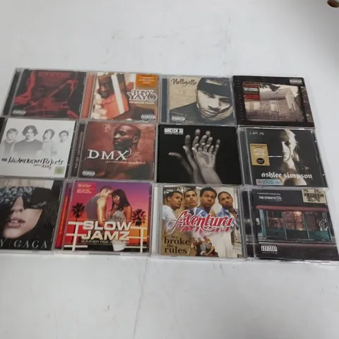 LOT OF APPROXIMATELY 35 ASSORTED CDS TO INCLUDE ASHLEE SIMPSON, EMINEM AND DMX