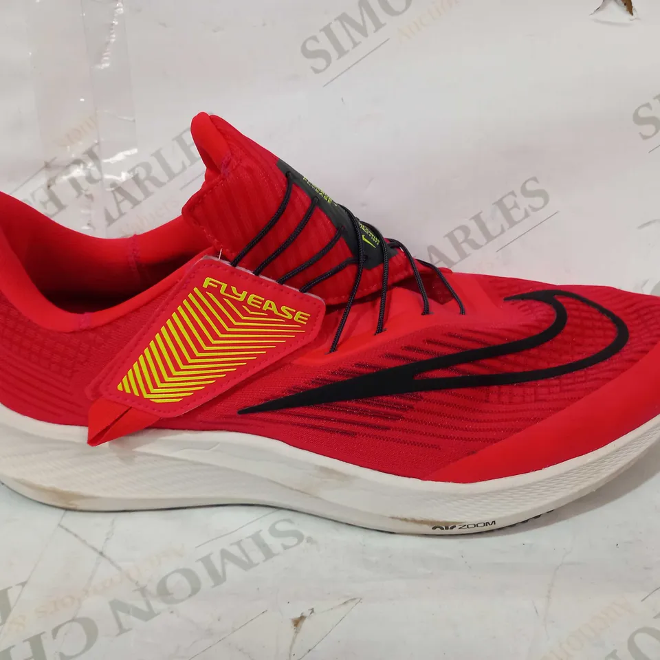 BOXED PAIR OF NIKE FLYEASE TRAINERS IN RED UK SIZE 12
