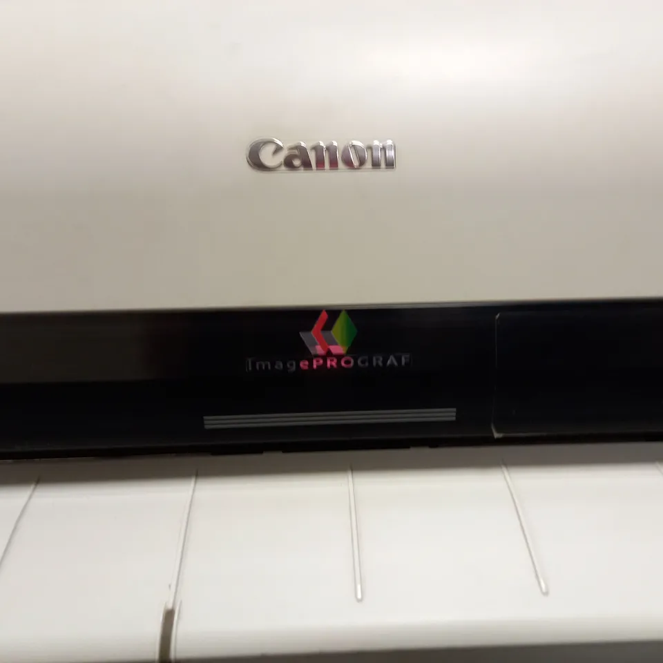 CANON IMAGEPROGRAF IPF710 WITH TWO ROLLS OF UNCOATED INKJET PAPER (1 x 90gsm [914x45mm] & 1 x 80gsm [841x45mm]) AND TWO PACKS OF BLACK INK (PFI-102BK) - COLLECTION ONLY