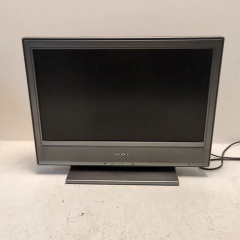 SONY BRAVIA FLAT-SCREEN TV/MONITOR – SILVER FRAME, ON STAND