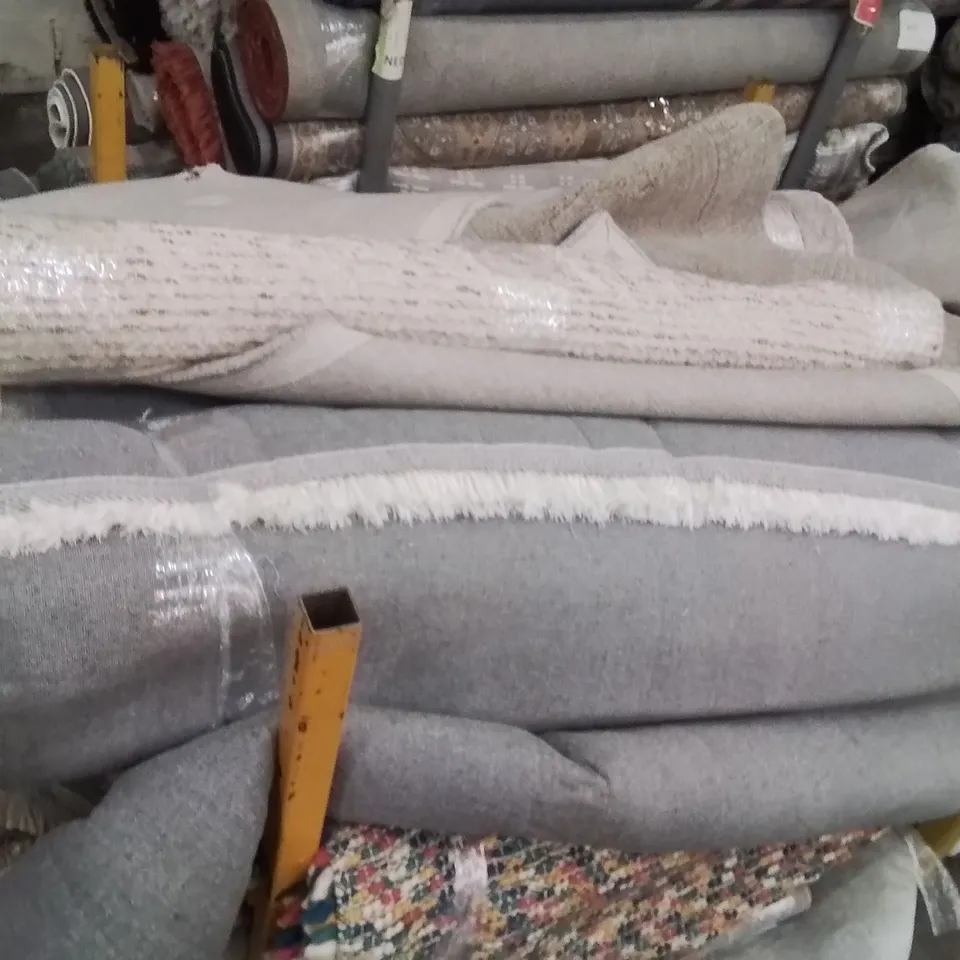 STILLAGE OF APPROXIMATELY 20 QUALITY DESIGNER RUGS
