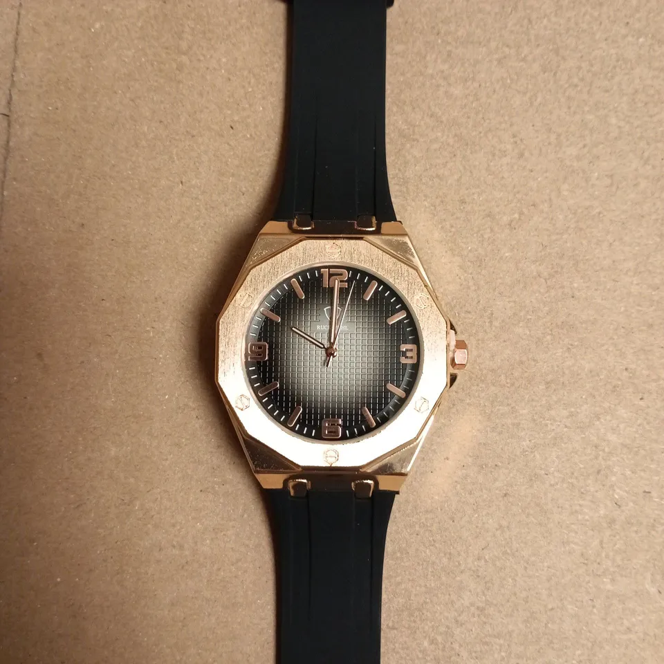 BOXED RUCKSTUHL ROSE GOLD TONE OCTAGONAL WRISTWATCH WITH BLACK RUBBER STRAP