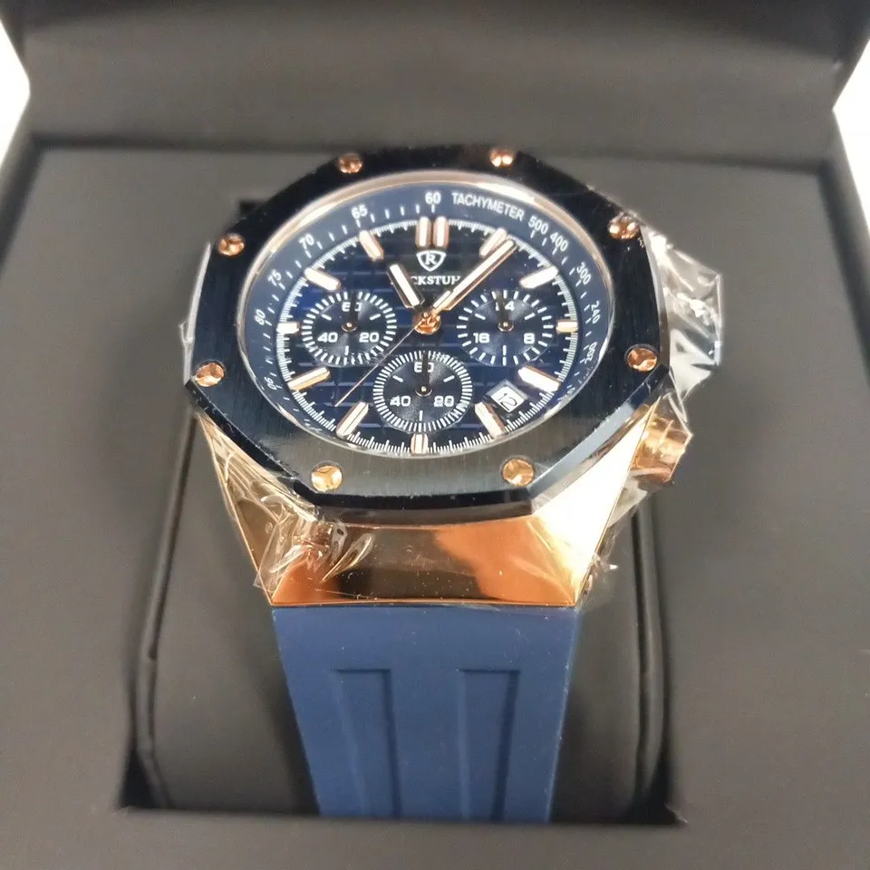 MEN’S RUCKSTUHL CHRONOGRAPH R400 WATCH – SILVER COLOUR CASE – SILVER DIAL – 3ATM WATER RESISTANT – BLUE RUBBER STRAP 