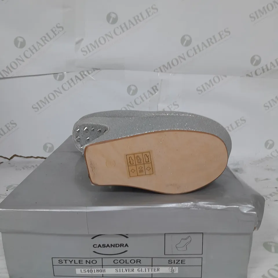 BOXED PAIR OF CASANDRA PLATFORM ANKLE SHOE IN SILVER GLITTER WITH SILVER STUD DETAIL SIZE 6