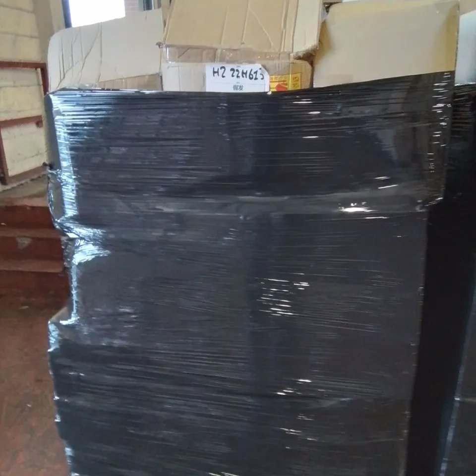 PALLET CONTAINING LARGE AMOUNT OF HAIR BUN EXTENSION PIECES 