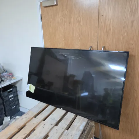 FLAT SCREEN TELEVISION β CRACKED SCREEN LG 65INCH NO STAND