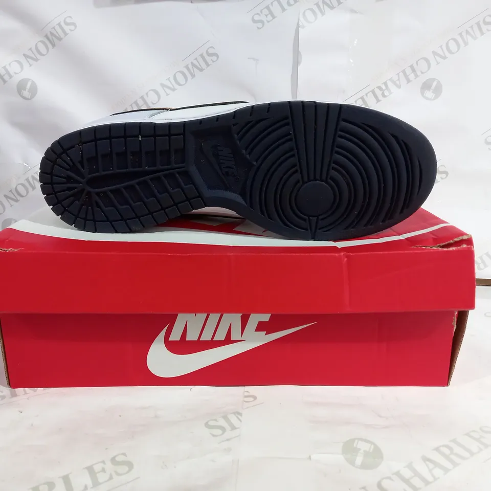 PAIR OF NIKE DUNK LOWS IN GREY/WHITE - UK SIZE 11
