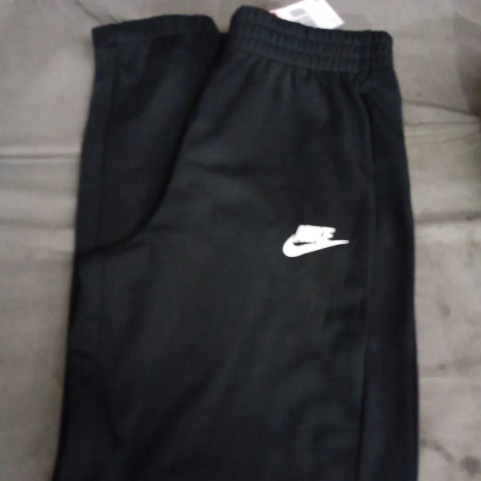 NIKE KIDS BLACK TRACKSUIT TROUSERS WITH WHITE SWOOSH LOGO - AGE UNSPECIFIED