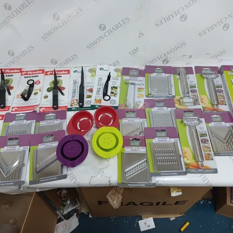 APPROXIMATELY 25 KITCHEN UTENSILS TO INCLUDE PIRANHA SPIRAL CUTTER, GIGANT GRATER, AND GIGANT PEELER ETC.