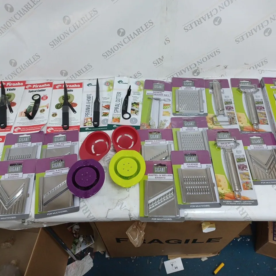 APPROXIMATELY 25 KITCHEN UTENSILS TO INCLUDE PIRANHA SPIRAL CUTTER, GIGANT GRATER, AND GIGANT PEELER ETC. 