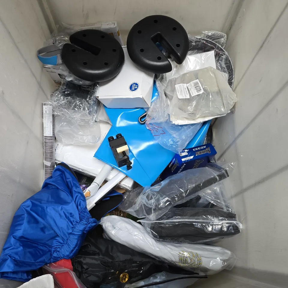 CAGE OF APPROXIMATELY 10 ASSORTED HOUSEHOLD ITEMS TO INCLUDE - PATIO WEIGHTS, FAKE FLOWERS AND POSTAGE PAPER  - COLLECTION ONLY
