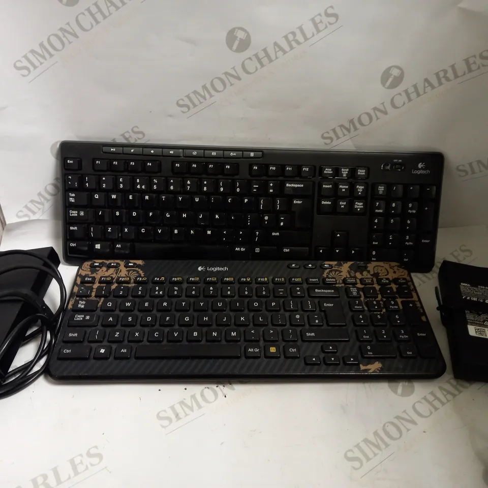 BOX OF 4 ITEMS INCLUDING 2 DELL AC ADAPTERS AND 2 LOGITECH WIRELESS KEYBOARDS
