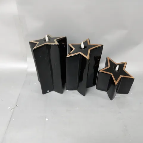 BOXED HOME REFLECTIONS PORCELAIN STAR PRE-LIT CANDLES IN BLACK 