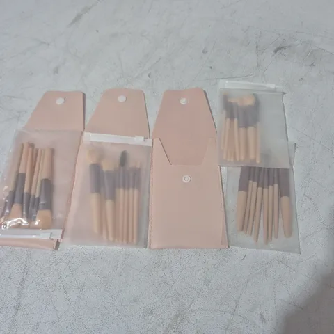 LOT OF APPROXIMATELY 40 8-PIECE MAKE UP BRUSH SETS WITH PALE PINK CARRY CASES