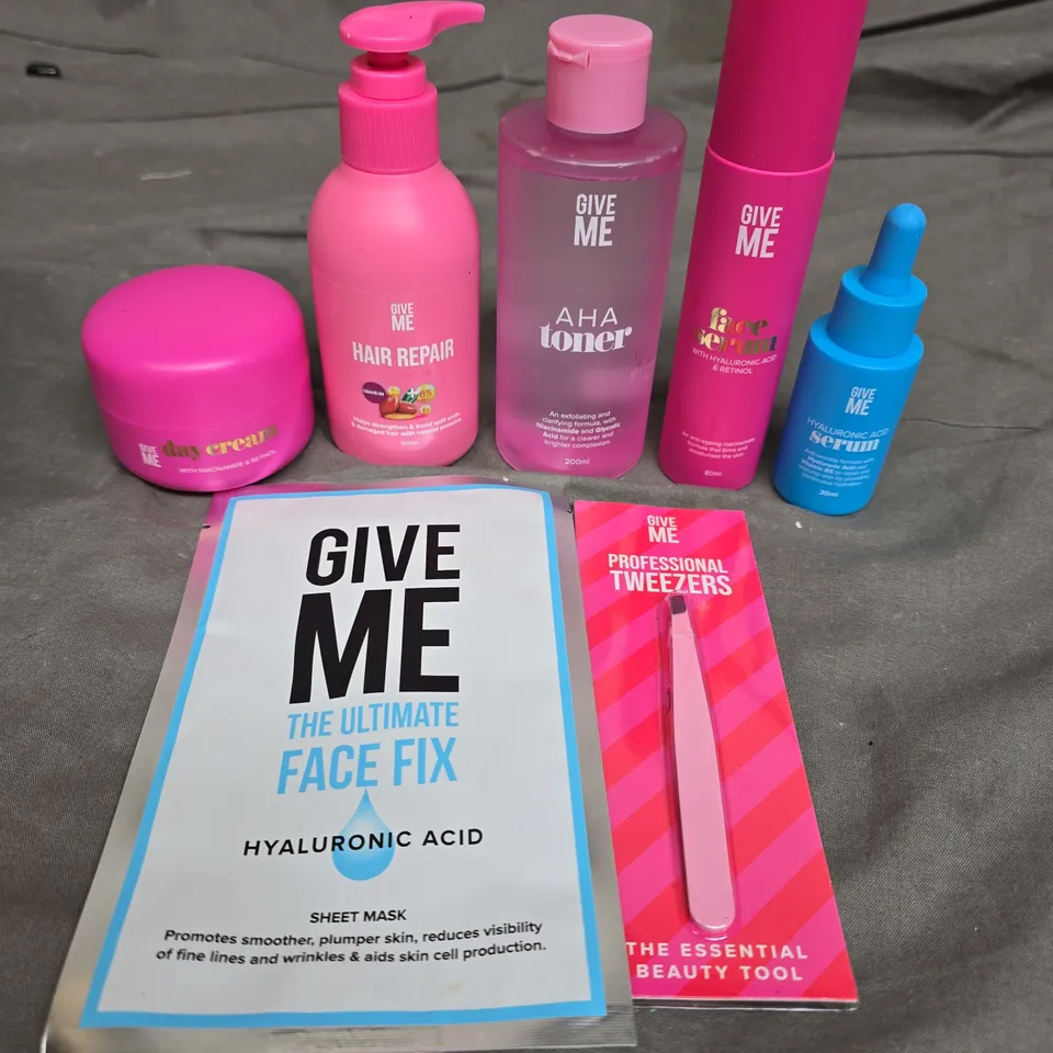 APPROX 7 ASSORTED GIVE ME PRODUCTS TO INCLUDE DAY CREAM, AHA TONER, FACE SERUM, ETC 