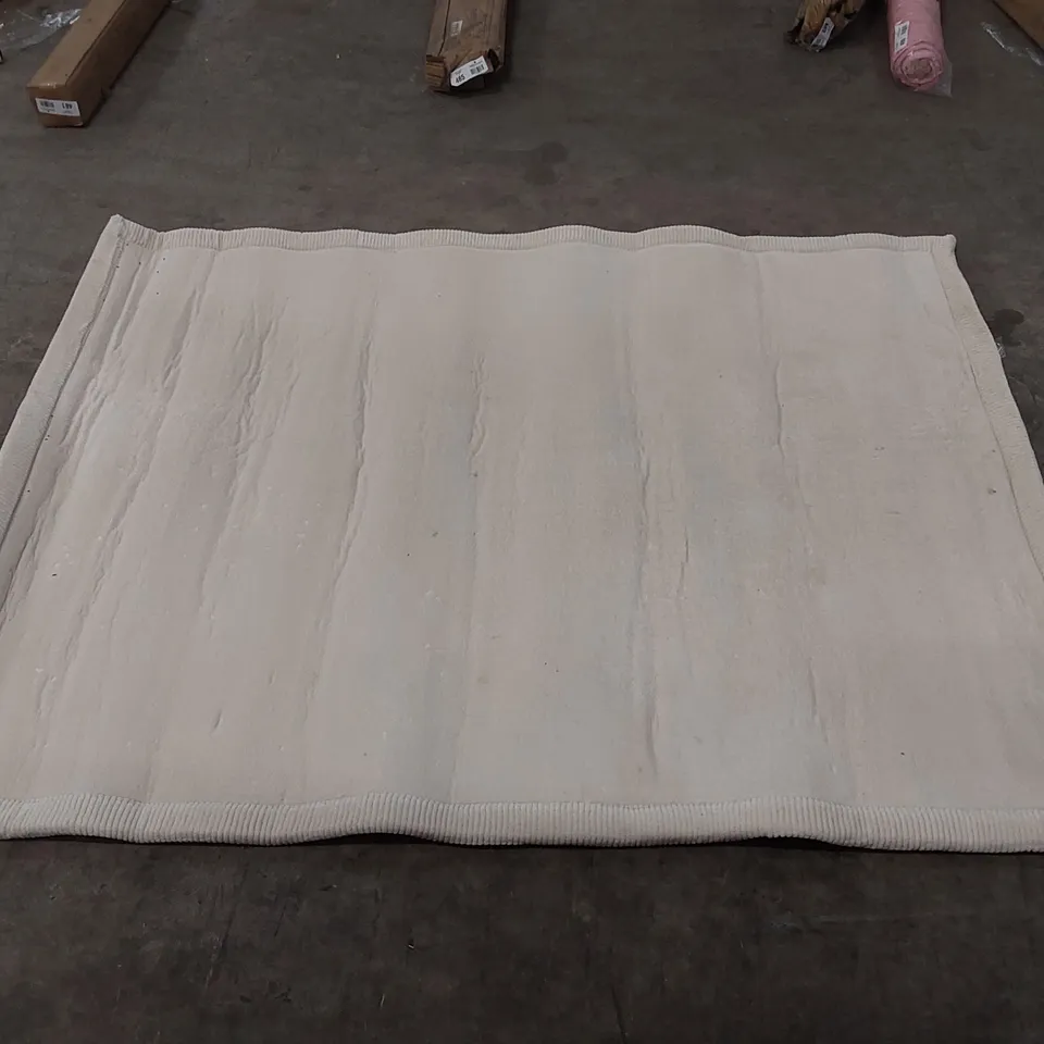 PACO HOME RUG IN CREAM - APPROXIMATELY 190 x 143cm