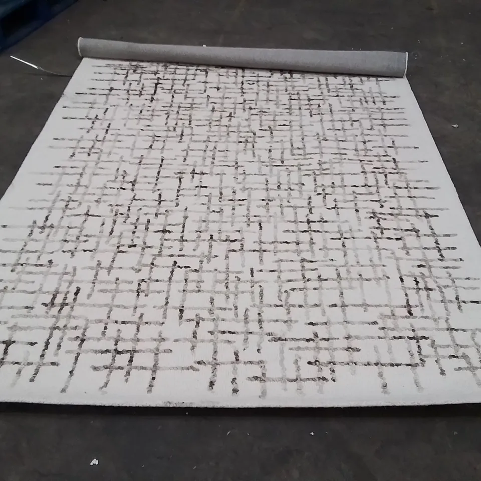 STILLAGE OF APPROXIMATELY 20 QUALITY BAGGED DESIGNER RUGS