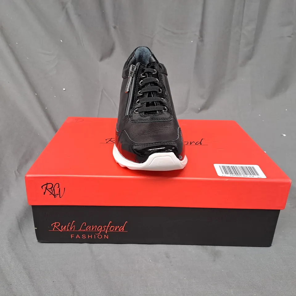 BOXED PAIR OF RUTH LANGSFORD WEDGE TRAINERS IN BLACK SIZE 4