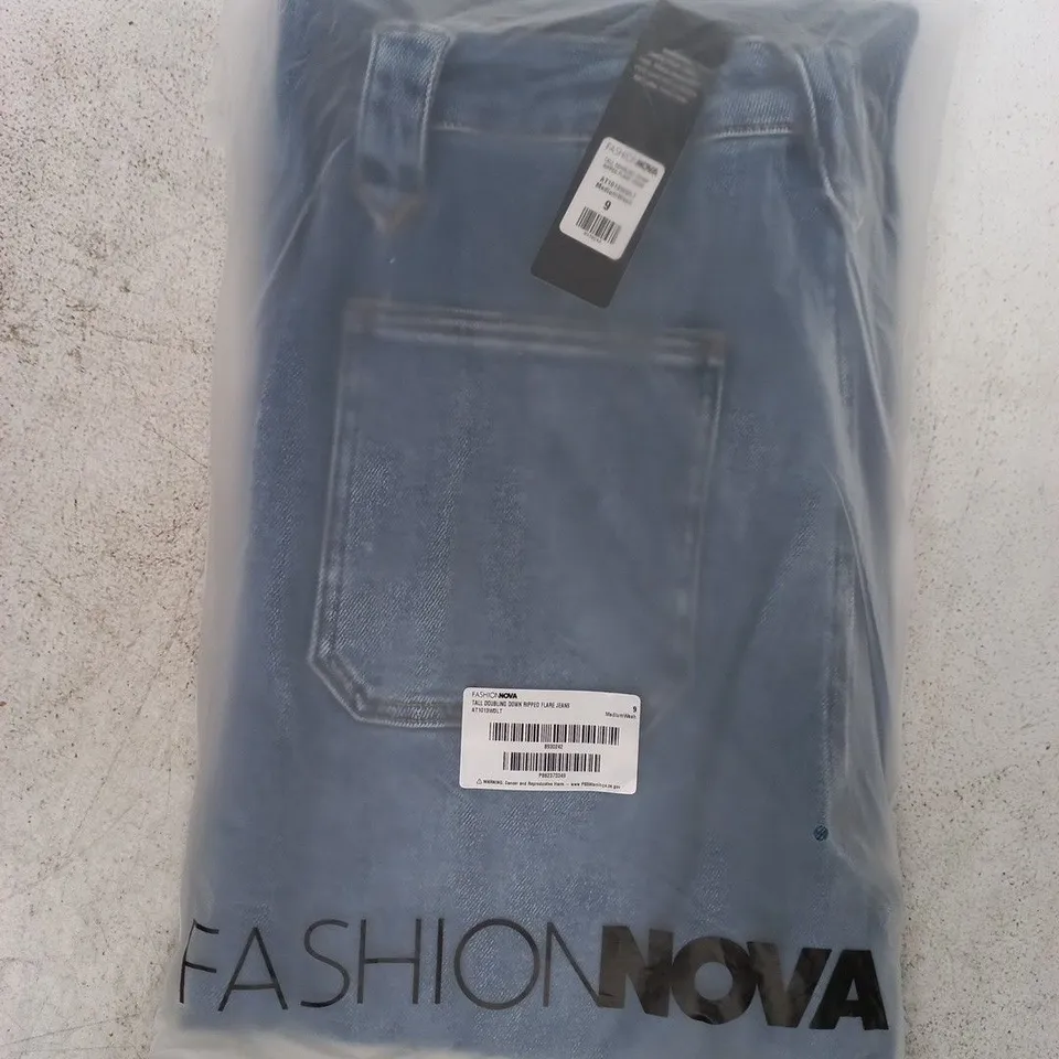 BAGGED FASHION NOVA TALL DOUBLING DOWN RIPPED FLARE JEANS IN BLUE SIZE 9