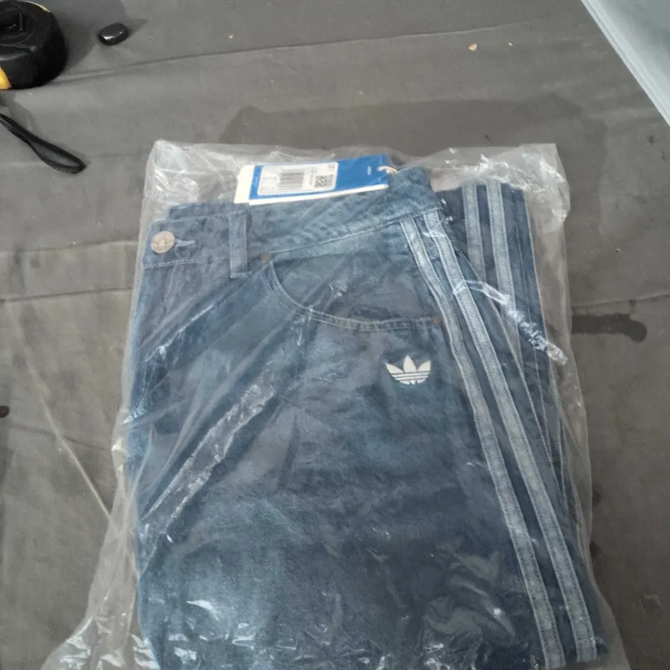 ADIDAS DENIM WIDE PANT – BLUE JEANS WITH WHITE STRIPES