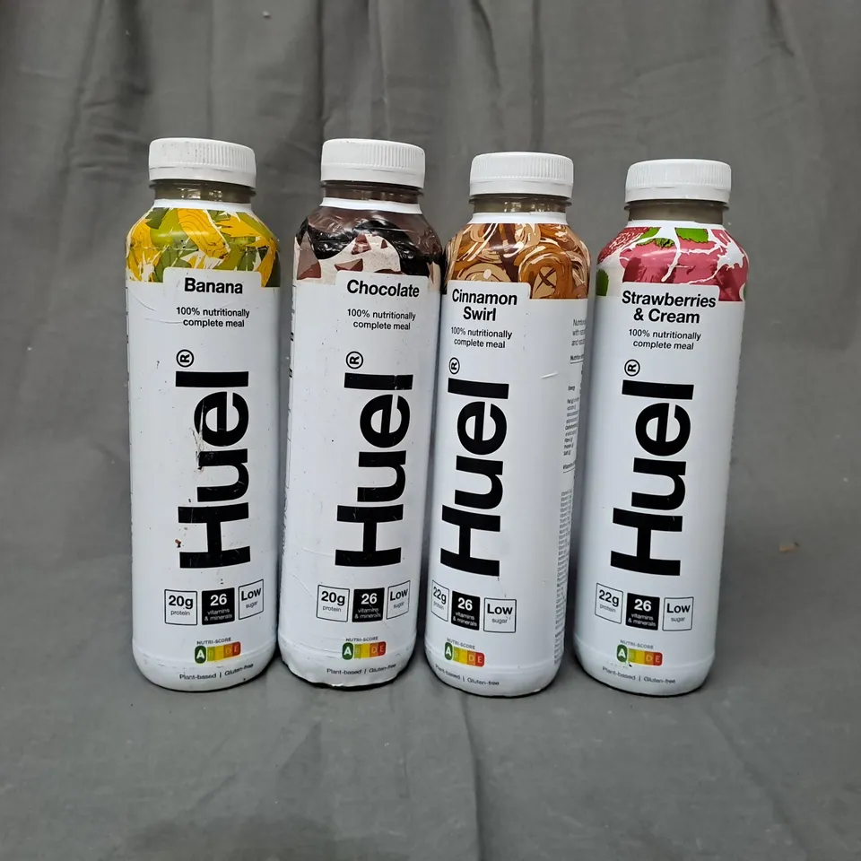 APPROXIMATELY 24 ASSORTED HUEL NUTRITION DRINKS TO INCLUDE BANANA, CHOCOLATE, CINNAMON SWIRL, STRAWBERRIES & CREAM 