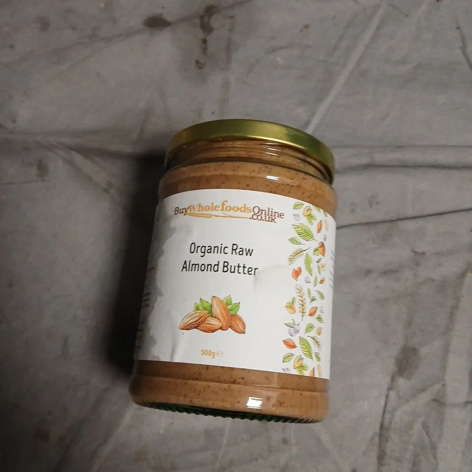 APROXIMATELY 15 ASSORTED FOOD ITEMS INCLUDING ORGANIC RAW ALMOND BUTTER , BENS ORIGINAL RICE AND NOOTZ COCONUT PASSION FRUIT SMOOTHIE